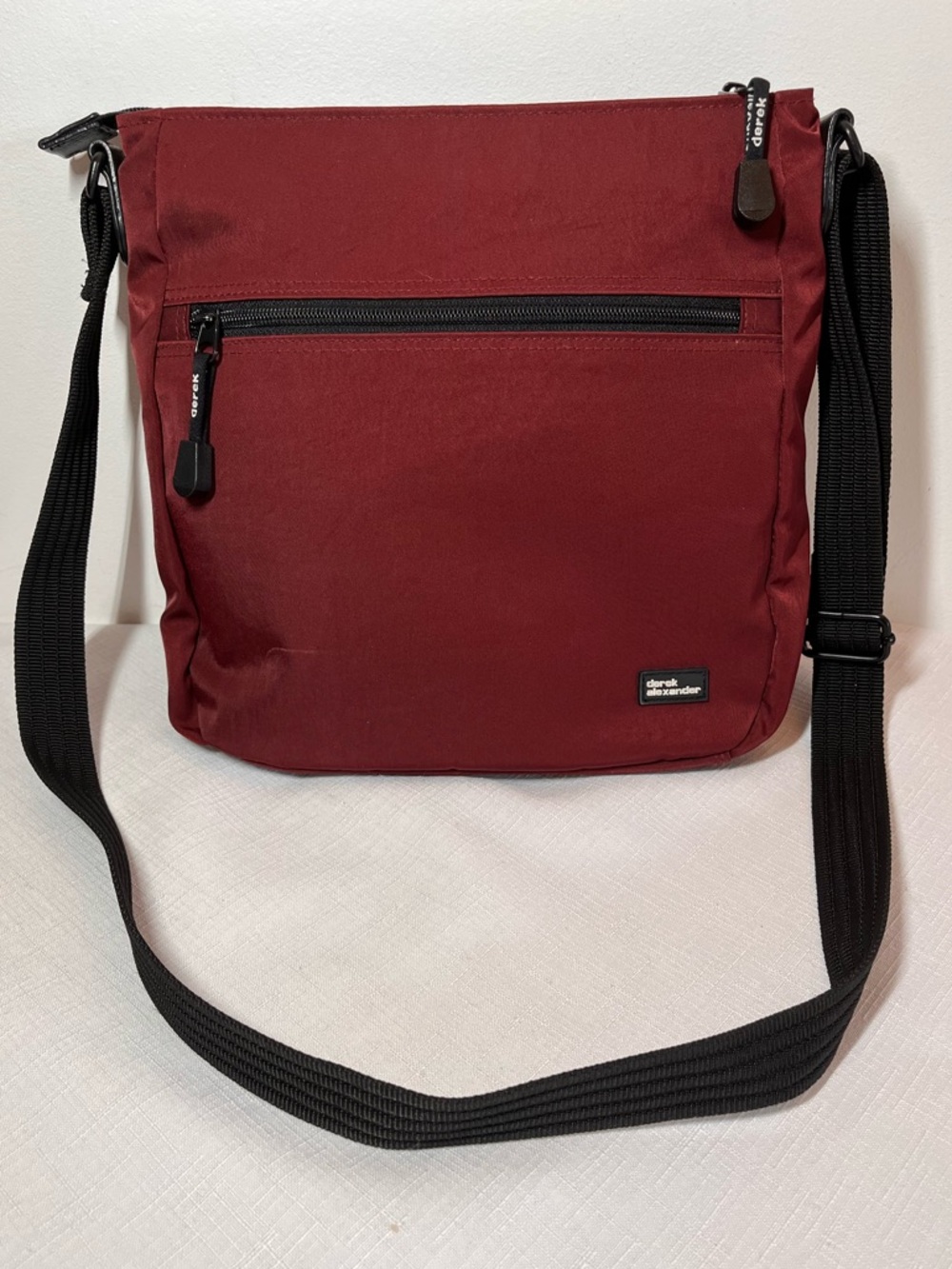 Derek Alexander Crossbody Messenger Bag - Wine Red. 
Lightweight. Nylon. Medium